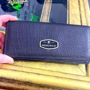 Vintage woolrich leather wallet.